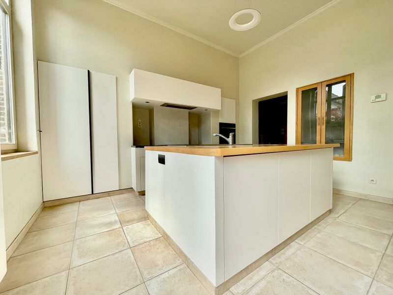 De bestaande keuken in Zevergem werd gerenoveerd.